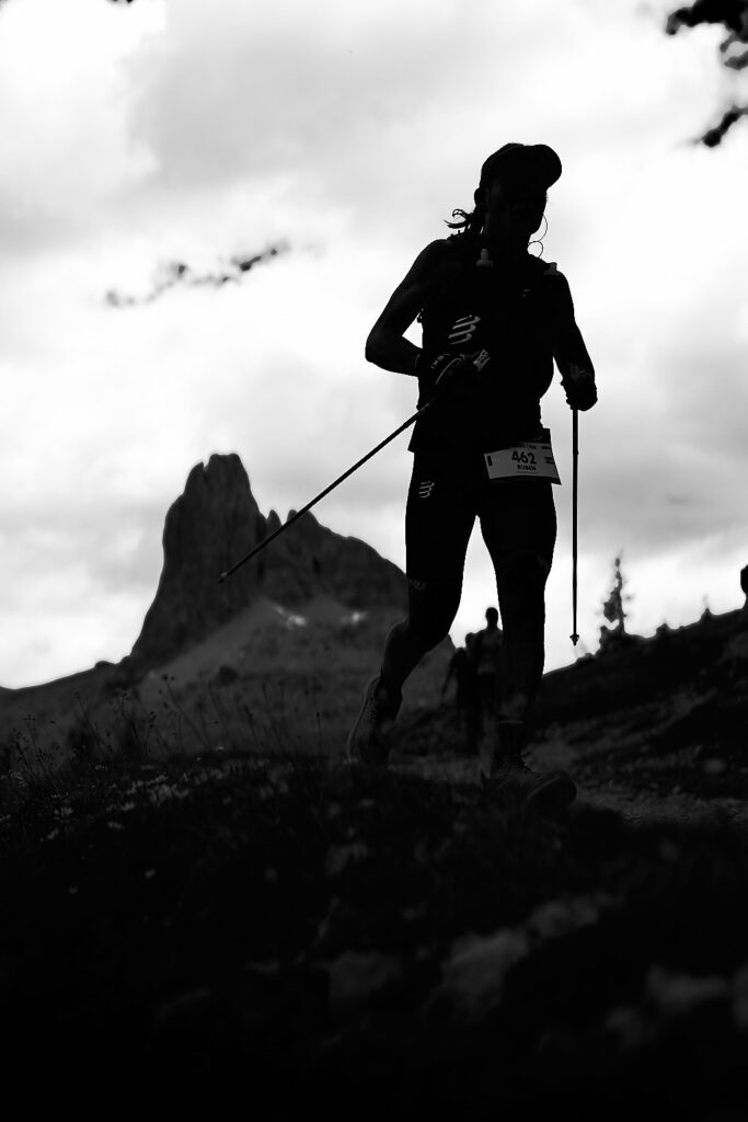 Runner in Croda da Lago area and Becco di Mezzodì on the background, Cortina d'Ampezzo @ Lavaredo Ultra Trail 2023