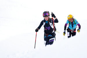 Italian athlete Martina Valmassoi (L) and her teammates Cecilia Roia De Filippo (R) competes at the 41th Transcavallo ski mountaineering race, on February 17, 2023 in Val Salatis, Tambre (Italy).